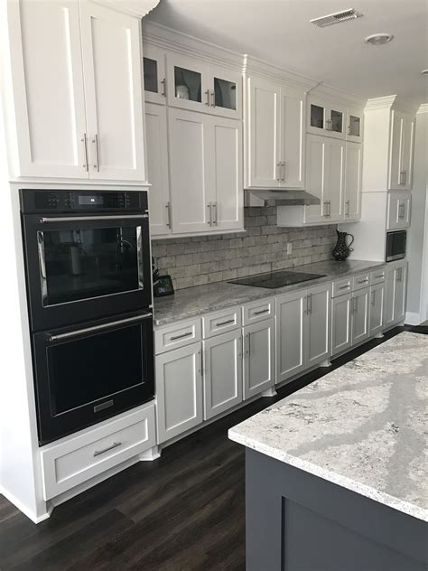 granite countertops white cabinets black stainless steel appliances|black cabinets with white base.